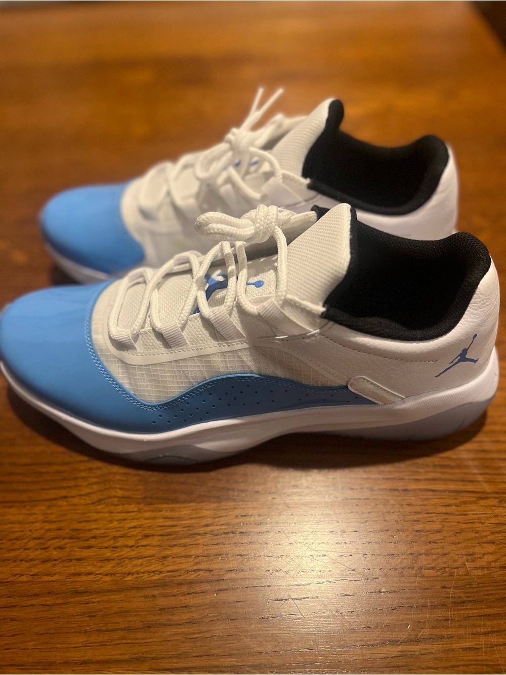 New, Never worn Air Jordan men’s size 11 CMFT Low-Top Sneakers University Blue